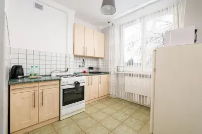Kuchnia lub aneks kuchenny w obiekcie Park Skaryszewski Standard Apartment by BookingHost