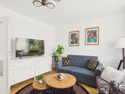 Telewizja i/lub zestaw kina domowego w obiekcie Jagiellońska 4 Family Residence by Solarento