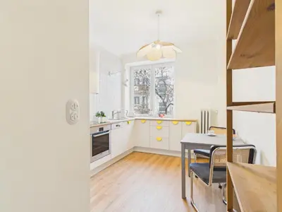 Kuchnia lub aneks kuchenny w obiekcie Dąbrowskiego Stylish Stay Warsaw by Solarento