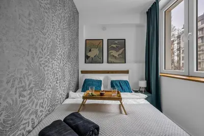 Łóżko lub łóżka w pokoju w obiekcie Muranów Apt - Metro, Top Location - by Rentujemy