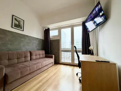 Telewizja i/lub zestaw kina domowego w obiekcie Flat next to Rondo ONZ