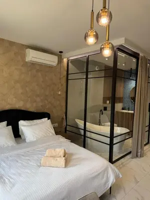 Łóżko lub łóżka w pokoju w obiekcie Targowa Premium Loft Warsaw National Stadium