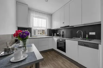 Kuchnia lub aneks kuchenny w obiekcie Modern 1BR in Bemowo - Parking & Workspace - by Rentujemy