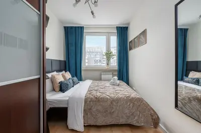 Łóżko lub łóżka w pokoju w obiekcie Lumina 3-rooms apartment with parking