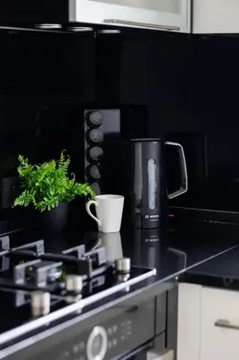 Kuchnia lub aneks kuchenny w obiekcie Cozy Apartment for 2 People Near the Palace of Culture and Science in Warsaw by Noclegi Renters