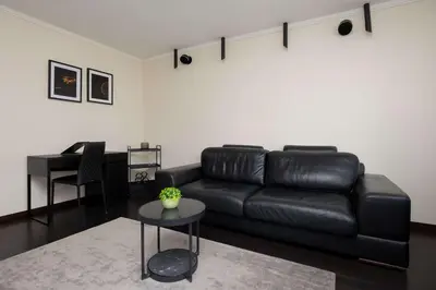 Część wypoczynkowa w obiekcie Cozy Apartment for 2 People Near the Palace of Culture and Science in Warsaw by Noclegi Renters