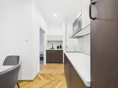 Kuchnia lub aneks kuchenny w obiekcie Warsaw Premium Apartments Mariensztat