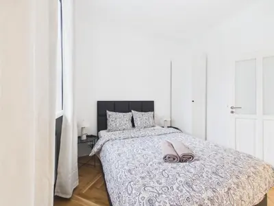 Łóżko lub łóżka w pokoju w obiekcie Warsaw Premium Apartments Mariensztat