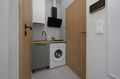 Kuchnia lub aneks kuchenny w obiekcie Functional Pet-Friendly Micro-Apartment in Warsaw by Noclegi Renters