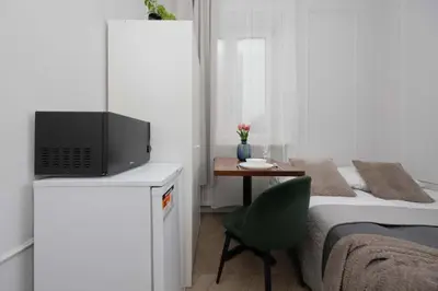 Łóżko lub łóżka w pokoju w obiekcie Functional Pet-Friendly Micro-Apartment in Warsaw by Noclegi Renters