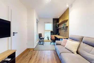 Telewizja i/lub zestaw kina domowego w obiekcie Halo Apartment with AC Wola Rondo Daszynskiego