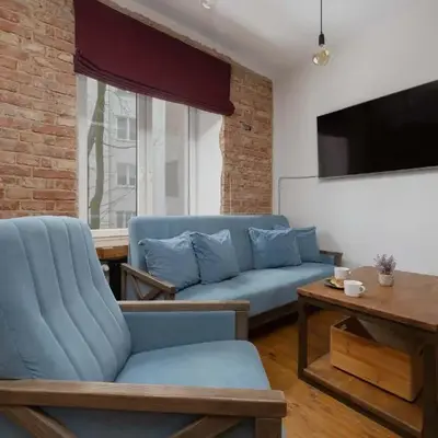 Loft Apartment in a Well-Connected District in Warsaw by Noclegi Renters