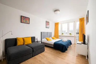 Część wypoczynkowa w obiekcie Broniewskiego Comfort Studio by BookingHost
