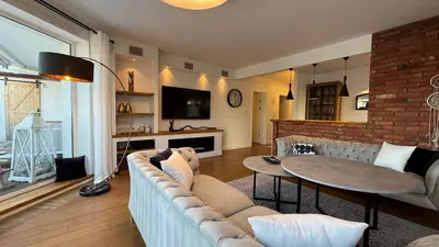 Telewizja i/lub zestaw kina domowego w obiekcie Family Apartment Kabaty - Duży Taras