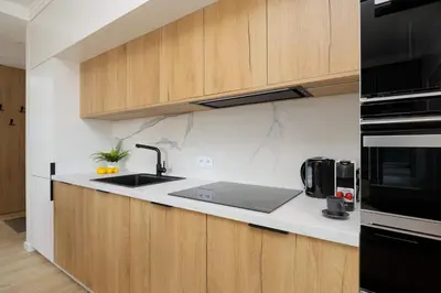 Kuchnia lub aneks kuchenny w obiekcie Luxury Apartment in Warsaw with 2 Bedrooms and Parking by Renters Prestige