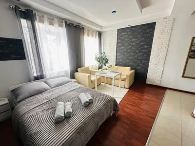 Łóżko lub łóżka w pokoju w obiekcie Freta Old Town apartment