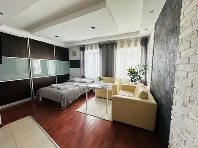 Łóżko lub łóżka w pokoju w obiekcie Freta Old Town apartment