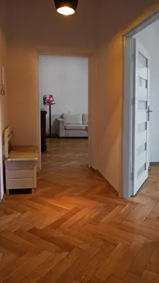 Łóżko lub łóżka w pokoju w obiekcie Center Apartment