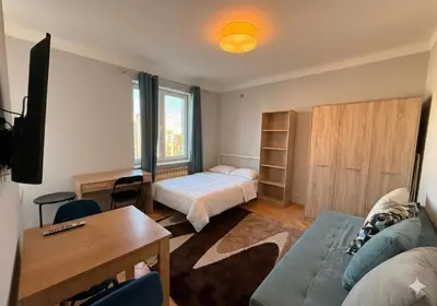 Telewizja i/lub zestaw kina domowego w obiekcie Center Studio Apart