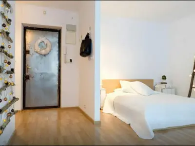Łóżko lub łóżka w pokoju w obiekcie Piwna Vintage Apartment