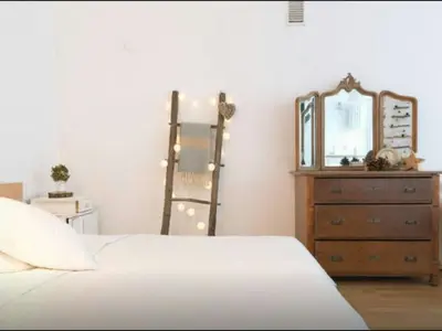 Łóżko lub łóżka w pokoju w obiekcie Piwna Vintage Apartment