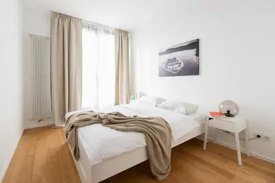 Łóżko lub łóżka w pokoju w obiekcie Warsaw Aparthotel