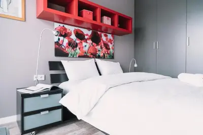 Łóżko lub łóżka w pokoju w obiekcie Warsaw Aparthotel