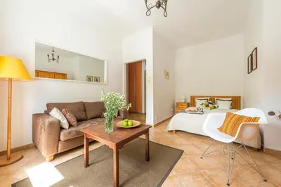 Łóżko lub łóżka w pokoju w obiekcie P&O Apartments Plac Zbawiciela