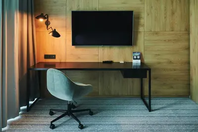 Telewizja i/lub zestaw kina domowego w obiekcie Courtyard by Marriott Warsaw Airport