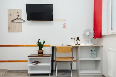 Telewizja i/lub zestaw kina domowego w obiekcie Arcus Premium Hostel