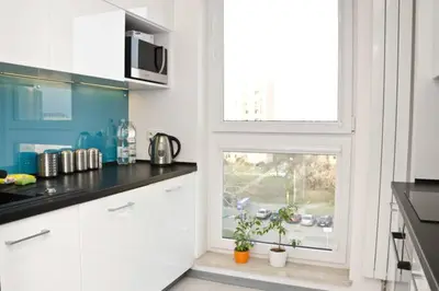 Kuchnia lub aneks kuchenny w obiekcie Modern & Functional Apartment Wwa