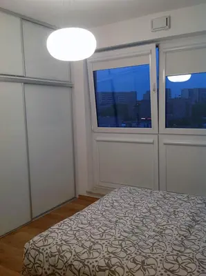 Łóżko lub łóżka w pokoju w obiekcie Modern & Functional Apartment Wwa