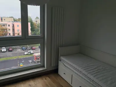 Łóżko lub łóżka w pokoju w obiekcie Modern & Functional Apartment Wwa