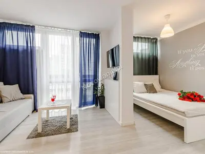 Łóżko lub łóżka w pokoju w obiekcie Apartment Oscar