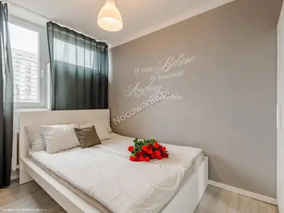 Łóżko lub łóżka w pokoju w obiekcie Apartment Oscar