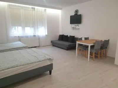 Łóżko lub łóżka w pokoju w obiekcie Center Warsaw- Apartamenty Smolna