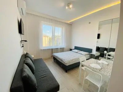 Łóżko lub łóżka w pokoju w obiekcie Center Warsaw- Apartamenty Smolna