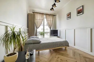 Łóżko lub łóżka w pokoju w obiekcie Studio Marszałkowska