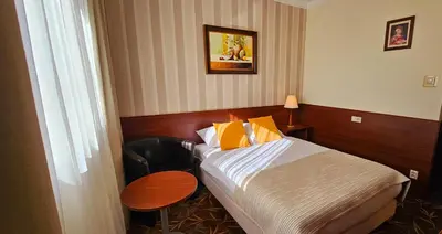 Łóżko lub łóżka w pokoju w obiekcie Centrum Barnabitów