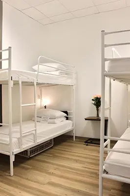 Łóżko lub łóżka w pokoju w obiekcie Warsaw Hostel Centrum Private Rooms & Dorms