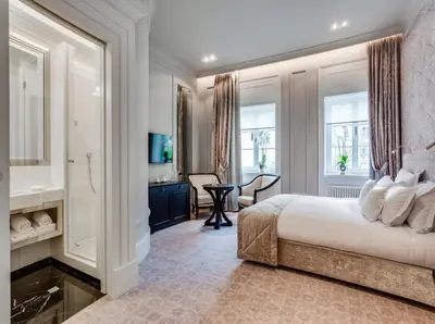 Łóżko lub łóżka w pokoju w obiekcie Hotel Bellotto