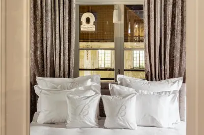 Łóżko lub łóżka w pokoju w obiekcie Hotel Bellotto