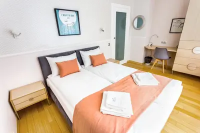 Łóżko lub łóżka w pokoju w obiekcie JessApart– Babka Tower Apartment