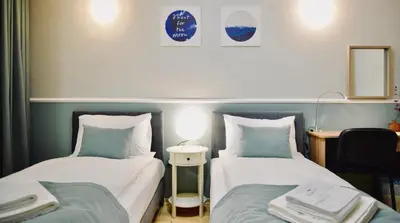 Łóżko lub łóżka w pokoju w obiekcie JessApart– Babka Tower Apartment