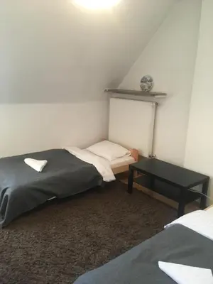 Łóżko lub łóżka w pokoju w obiekcie Murano Apartaments Old Town