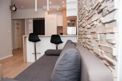 Część wypoczynkowa w obiekcie Apartament Obrzeżna 3 Deluxe
