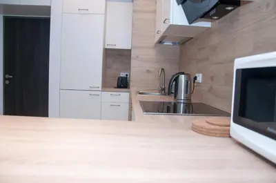 Kuchnia lub aneks kuchenny w obiekcie Apartament Obrzeżna 3 Deluxe