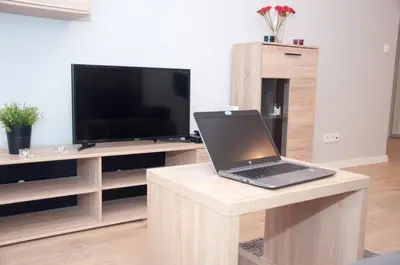 Telewizja i/lub zestaw kina domowego w obiekcie Apartament Obrzeżna 3 Deluxe