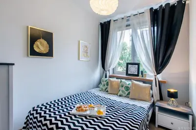 Łóżko lub łóżka w pokoju w obiekcie ClickTheFlat Avenue Place Apart Rooms