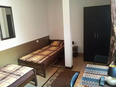 Łóżko lub łóżka w pokoju w obiekcie Hostel Maxim